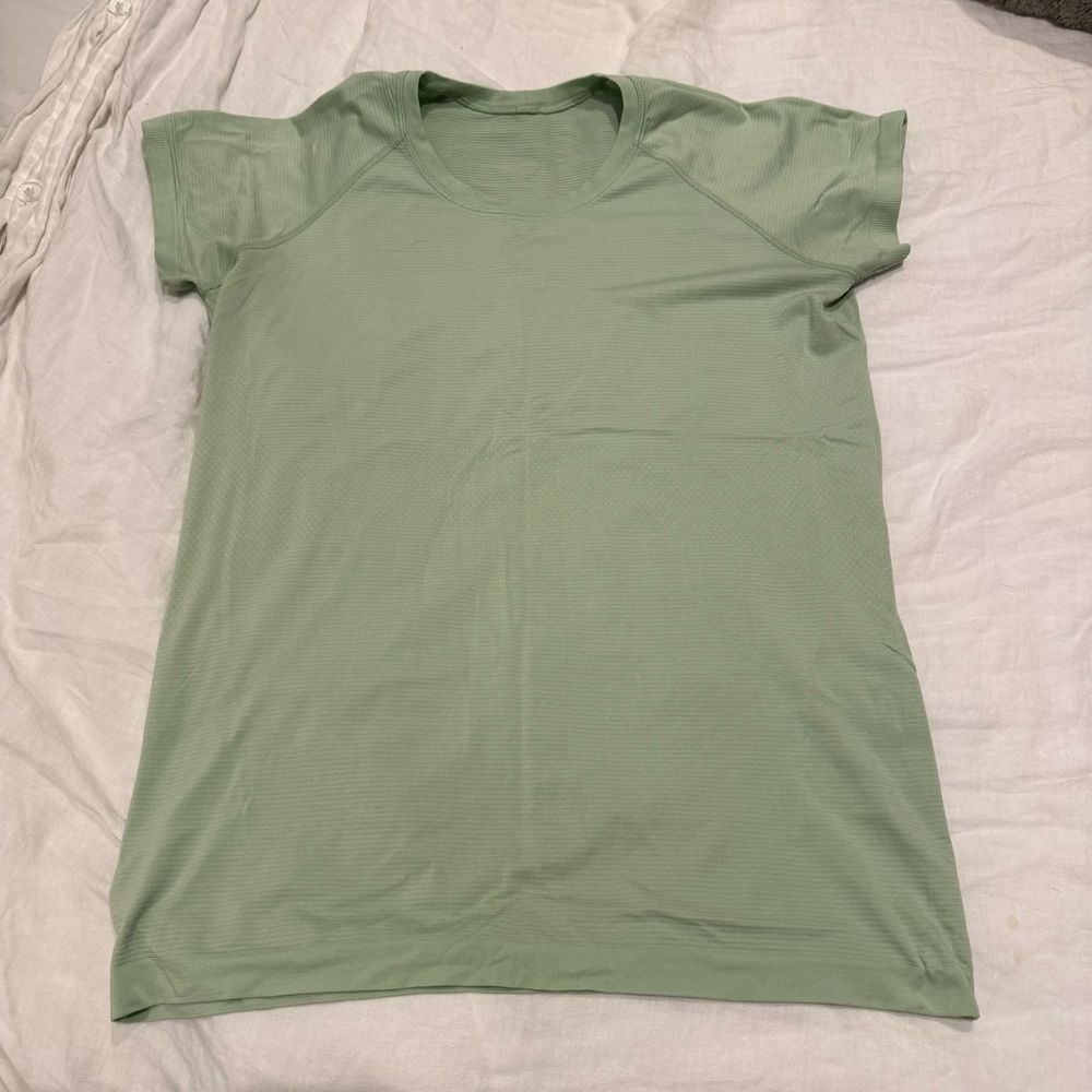 Lululemon swiftly tech short sleeve. Light green. Size 14. Lightly worn